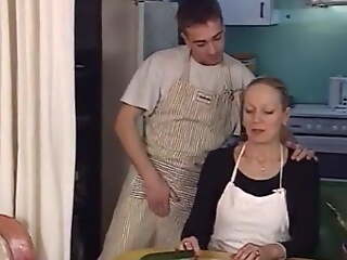 Fucking two MILFs in the kitchen