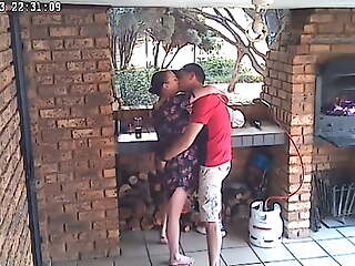 Spycam: CC TV self providing accomodation couple making out on front porch of nature reserve
