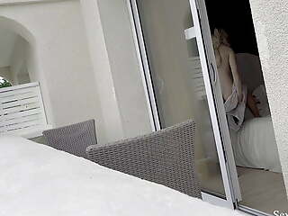 Hot spanish girl was secretly filmed relating to her hotel room through the window while she was taking some nude photes.