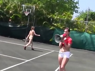 Hazing babes eating pussy on a tennis court